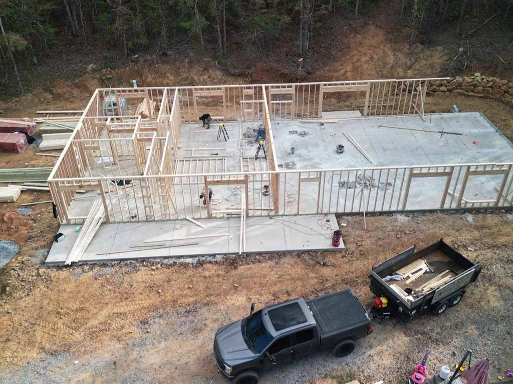Aerial view of a new home being framed